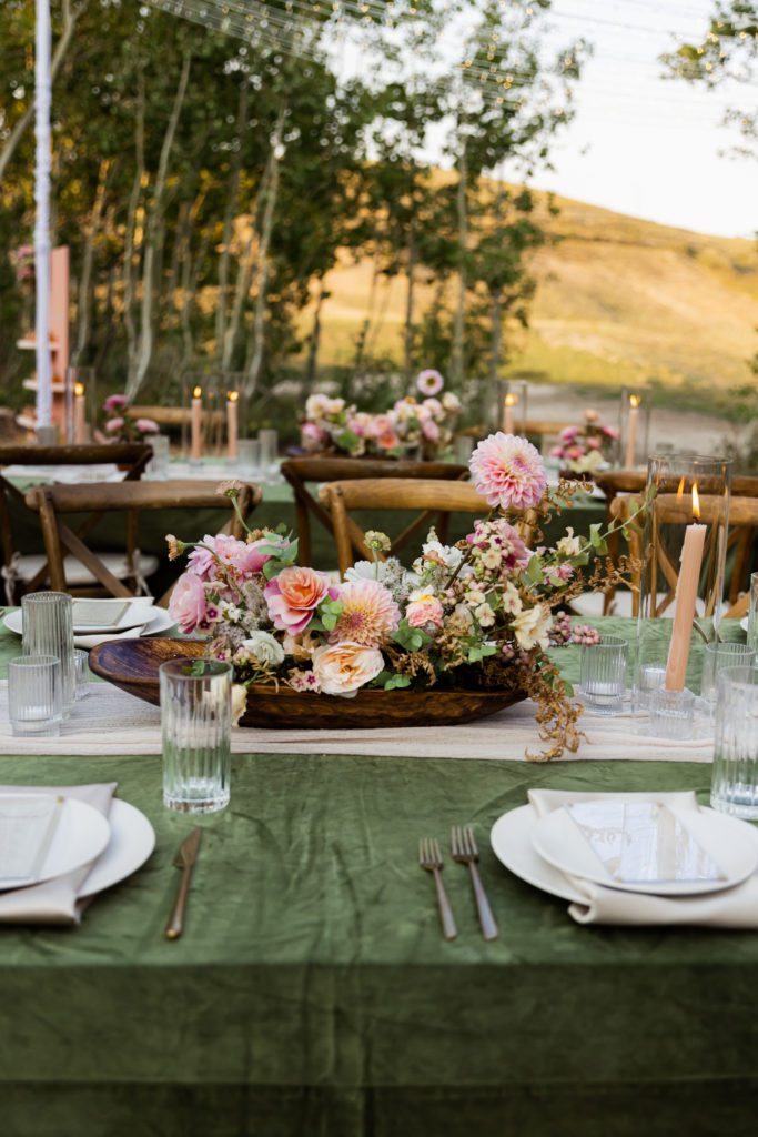 Unique tablescape with summer floral palette in Park City Utah Wedding Venue.