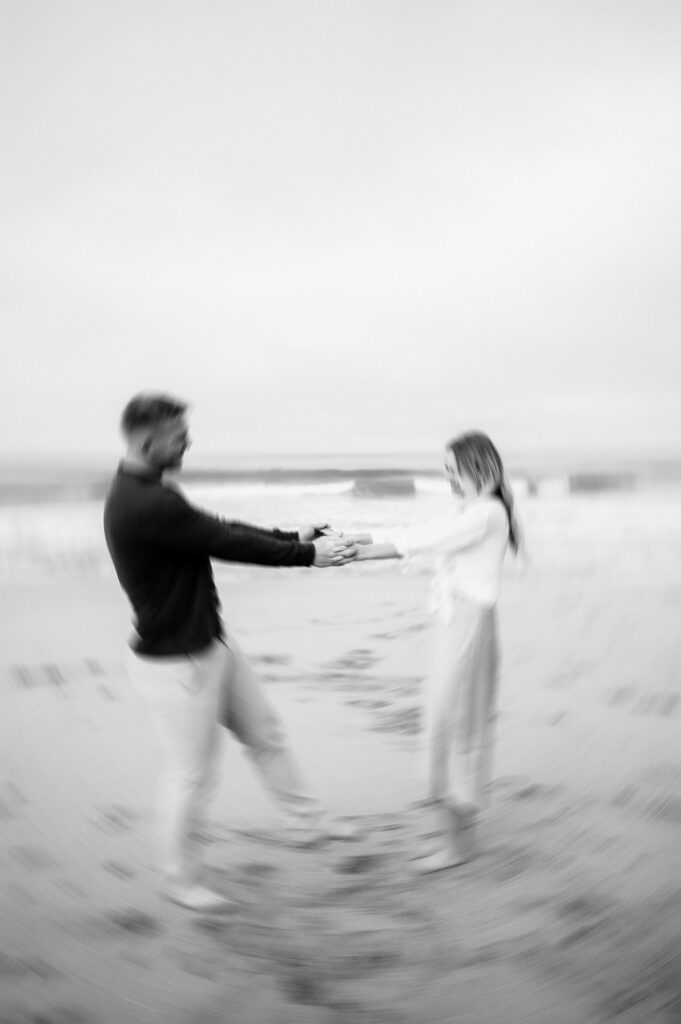 Black and white candid motion blur photo during San Francisco engagements