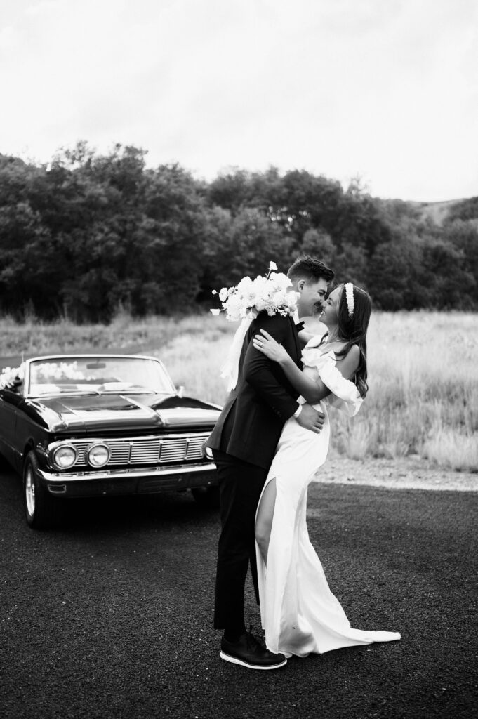 This vintage cruiser parked in the fall foliage of Dallas, Texas tied together a timeless look for these vintage car b&w bridals.