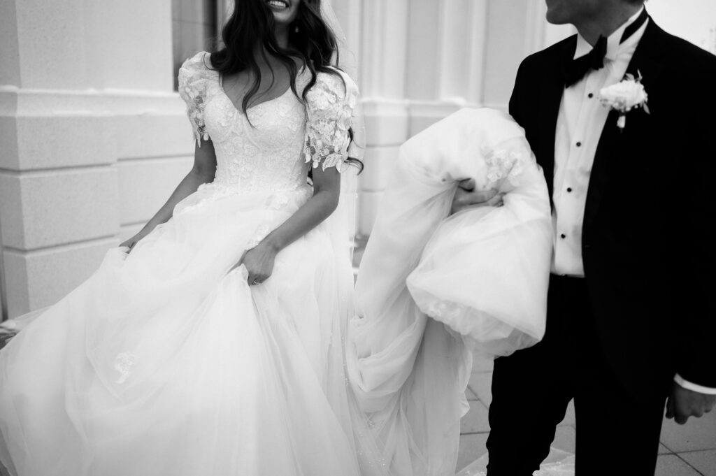 black and white photo of classic bridal fashion winter wedding