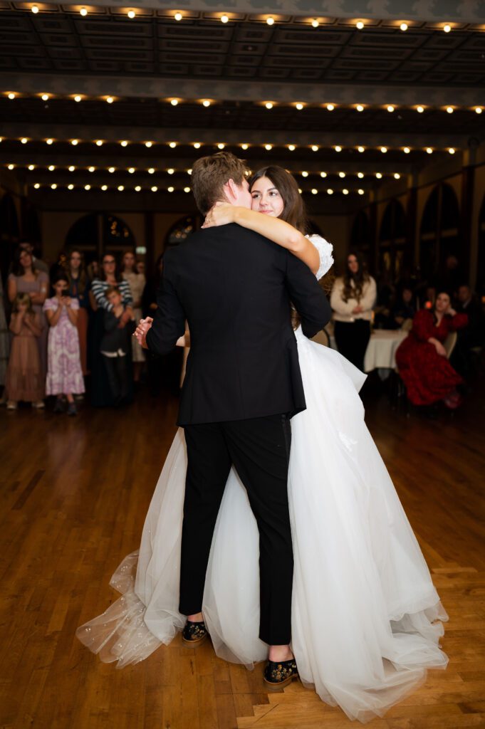 first dance between bride and groom at brigham city utah classic fashion winter wedding
