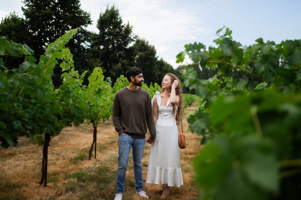 couple taking engagements in chateau st michelle winery in seattle washington