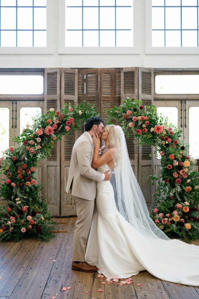 walker farms utah wedding ceremony first kiss photo