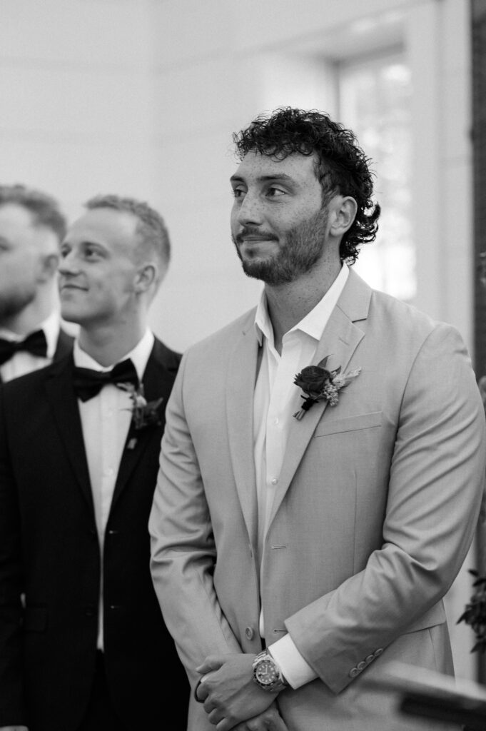 groom reaction to seeing bride at wedding ceremony