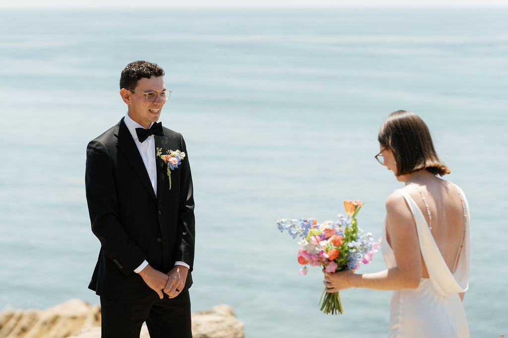 bride and groom's first look at sunset cliffs in san diego