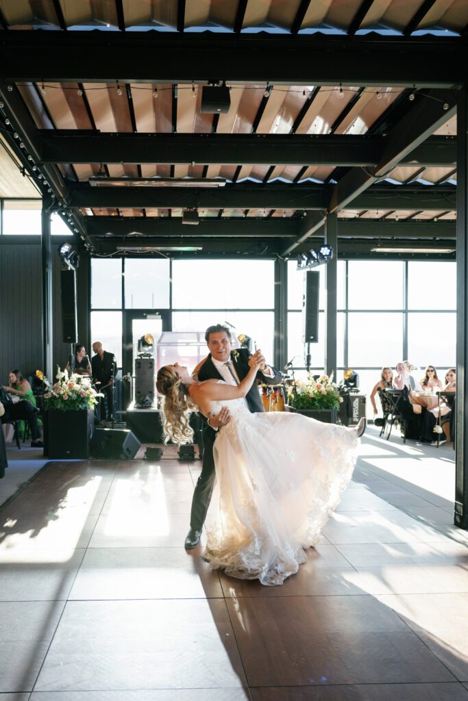 Couple dancing together at their Snow King Jackson Wyoming wedding