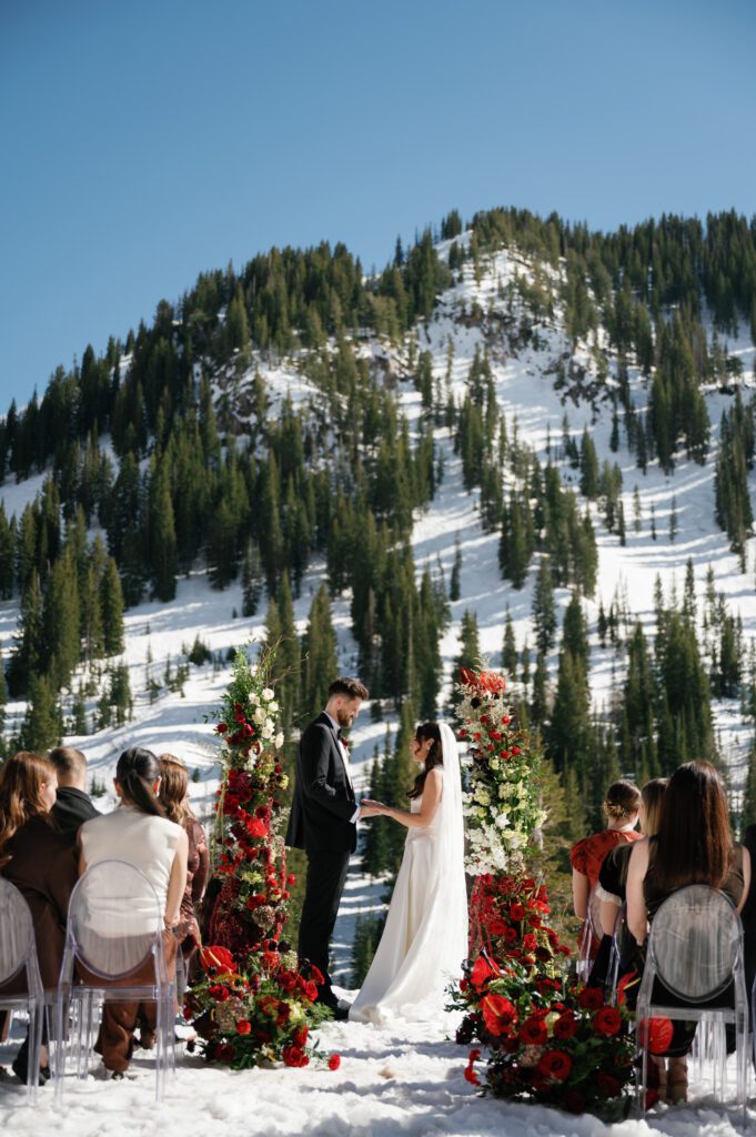 Outdoor winter wedding ceremony at Snow Pine Lodge Park city