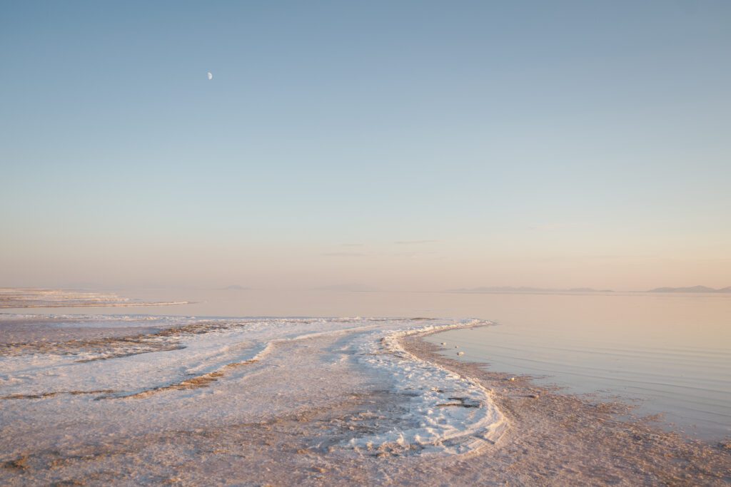 A shot of the beach at Sunset at Utah pink lake engagement photo shoot
