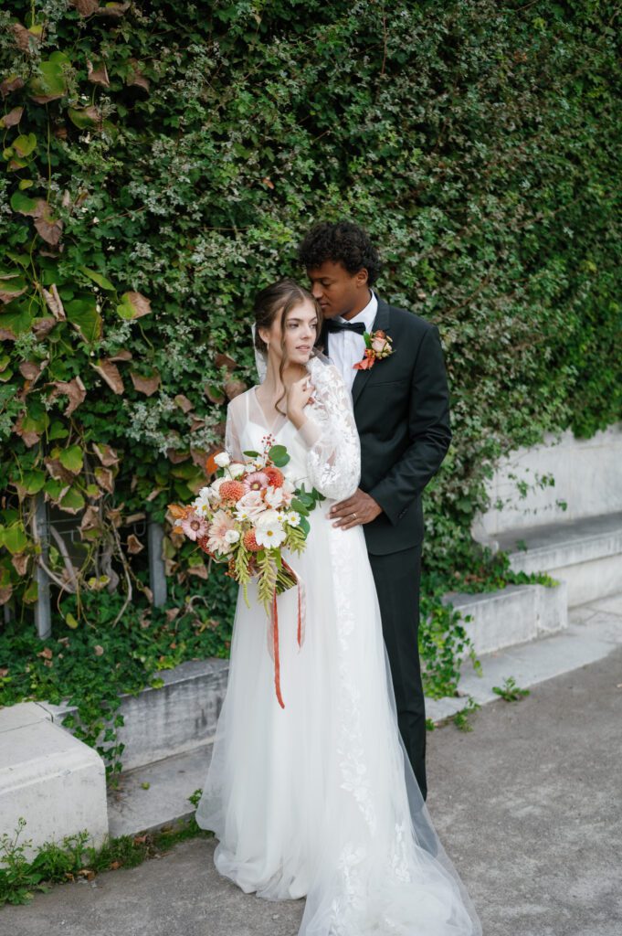 Bride and groom portrait outside at Schoenbrunn Palace Vienna wedding venue