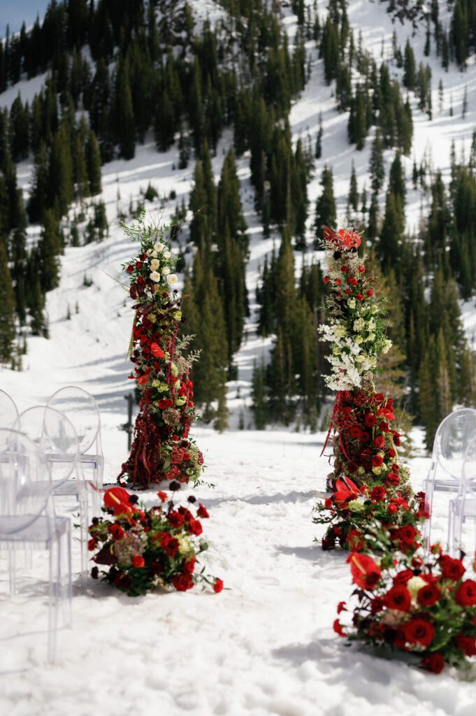The floral arch for outdoor winter wedding ceremony at Snow Pine Lodge Park city